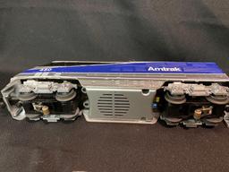 Amtrak Diesel Locomotive W/ (5) Coach Cars