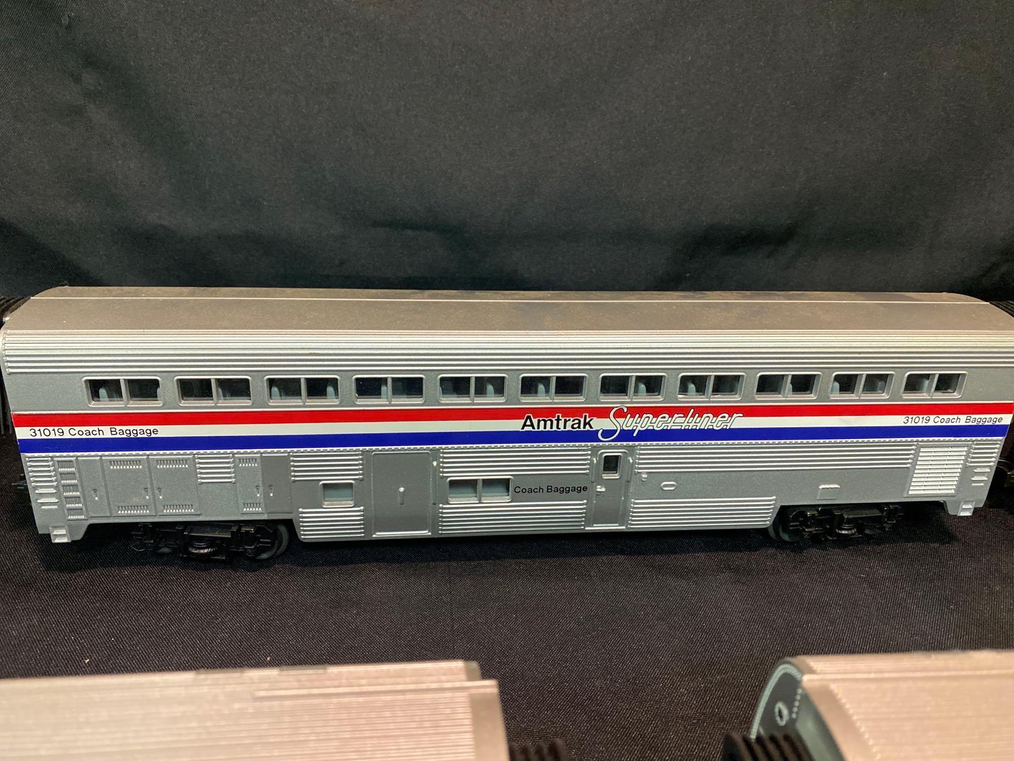 Amtrak Diesel Locomotive W/ (5) Coach Cars