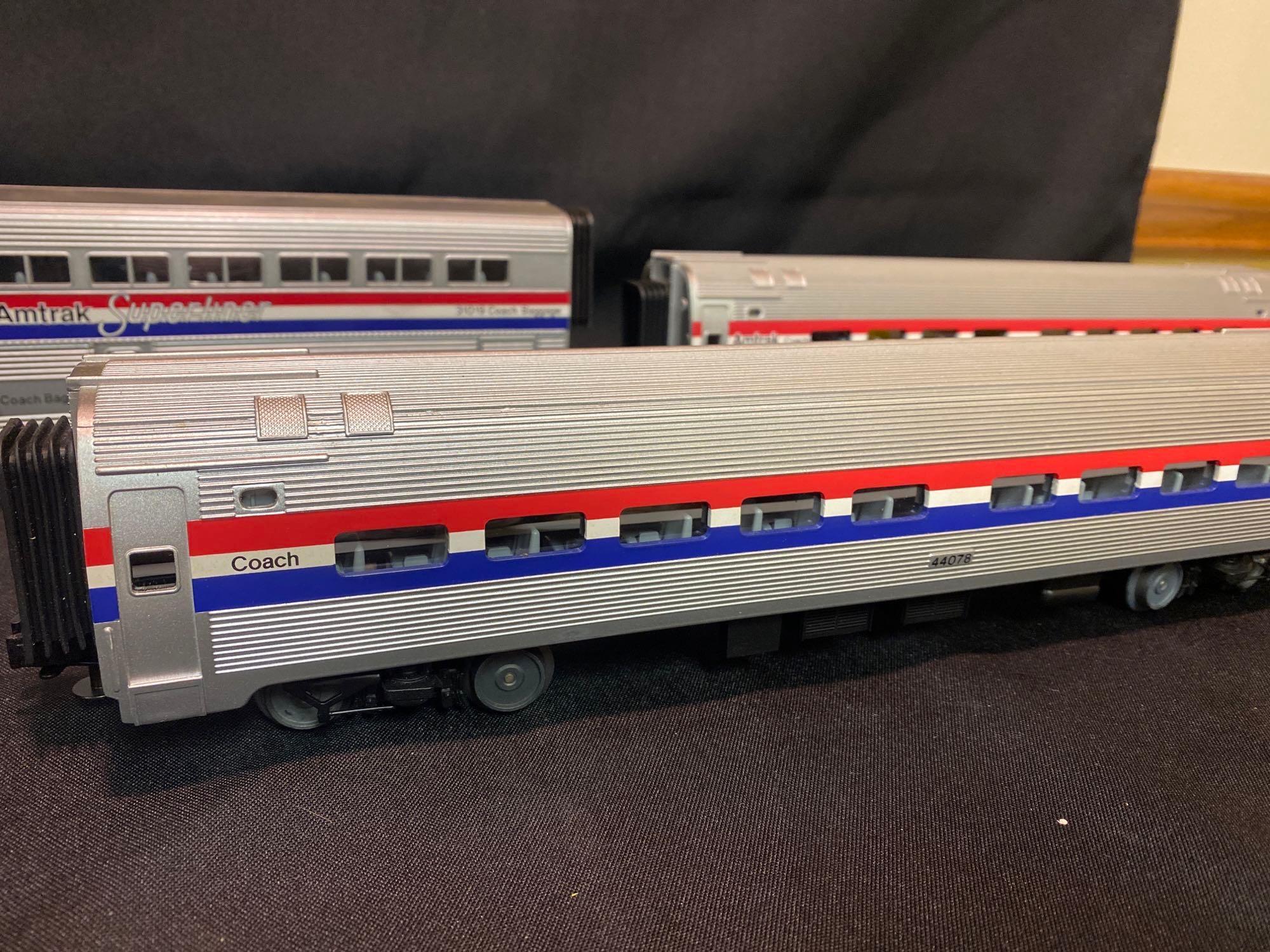 Amtrak Diesel Locomotive W/ (5) Coach Cars