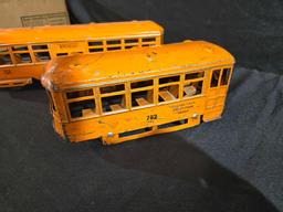 School Bus and Two Train Cars