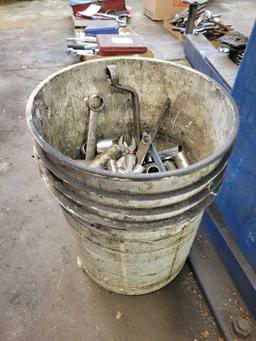 Bucket of sockets and wrenches