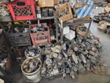 Large lot of starters and alternators, shelf, shop cart