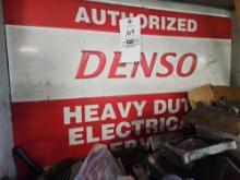 Denso metal sign