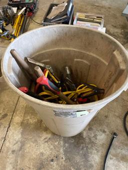 Trashcan Full of Yard Tools