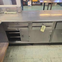 large stainless Steel counter with sink and outlets