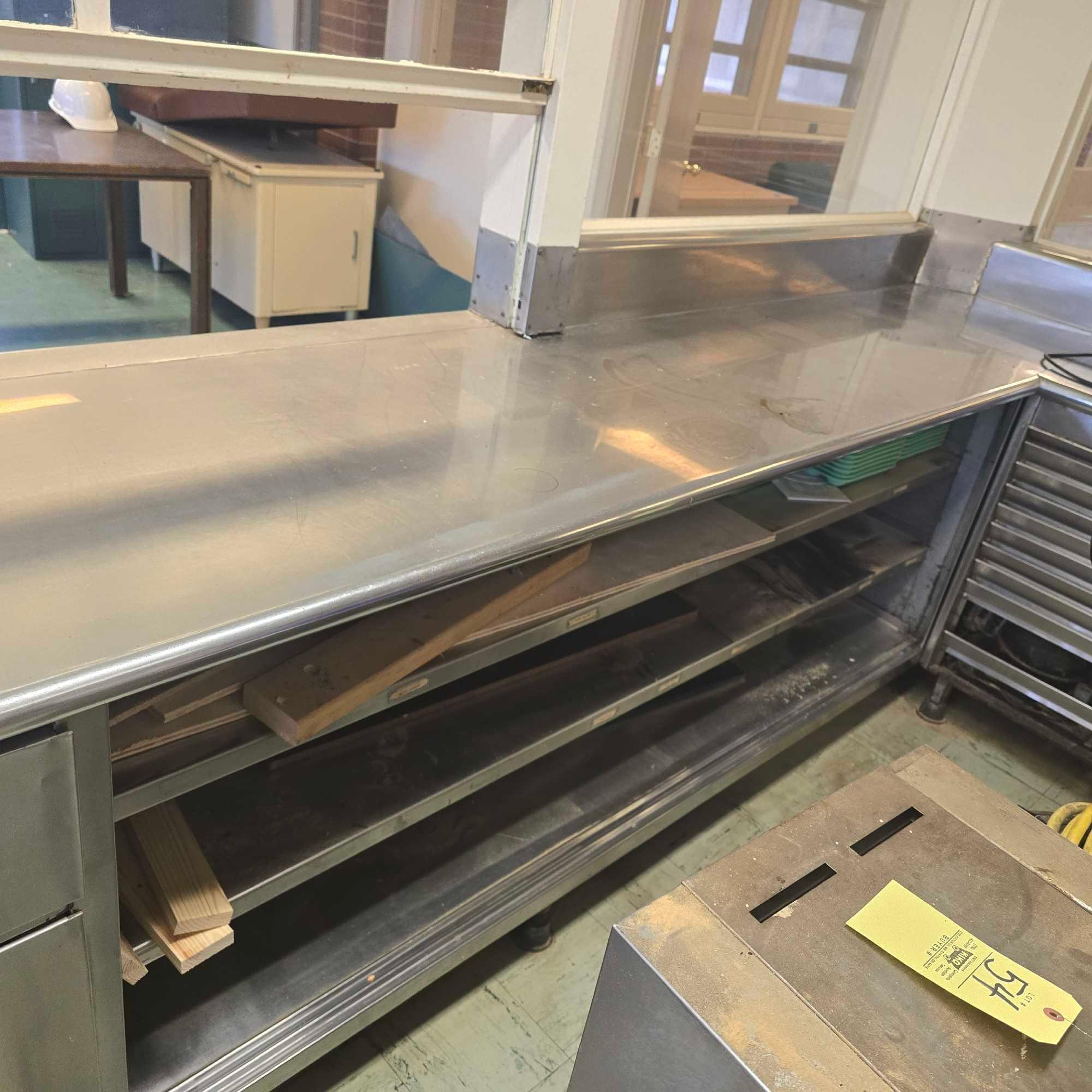 large stainless Steel counter with sink and outlets