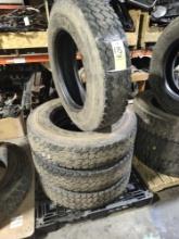 Tires; (4) 10R22.5 drives