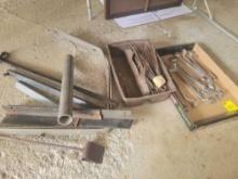 Group of box end wrenches, angle iron and metal landscape fabric pins