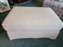 Upholstered ottoman: checkered velveteen