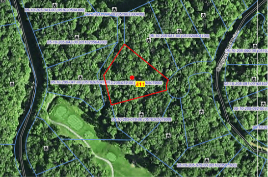 Year-Round Resort Living on this One Acre Golf Course Lot in Northern Michigan!