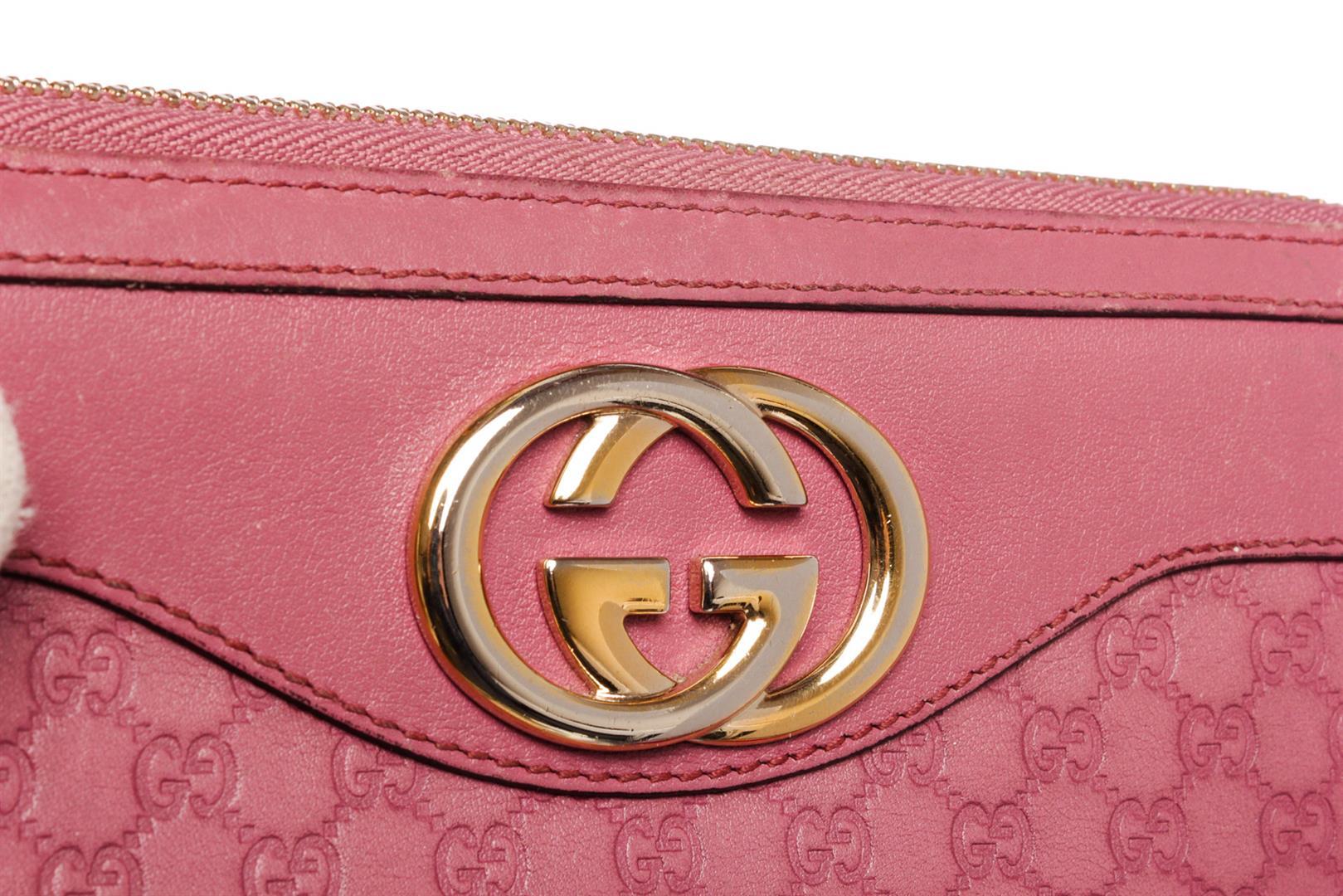 Gucci Pink Guccissima Leather Zippy Wallet