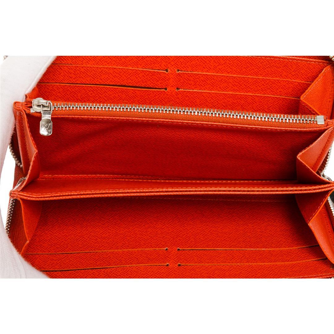 Louis Vuitton Orange Epi Leather Zippy Wallet