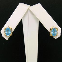 14K Yellow Gold 1.18 ctw Oval Blue Topaz & Round Diamond Halo Stud Earrings