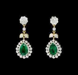 6.05 ctw Pear Brilliant Emerald And Round Brilliant Cut Diamond Earrings - 18KT