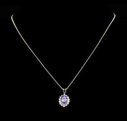 3.88 ctw Tanzanite and Diamond Pendant With Chain - 14KT Yellow Gold