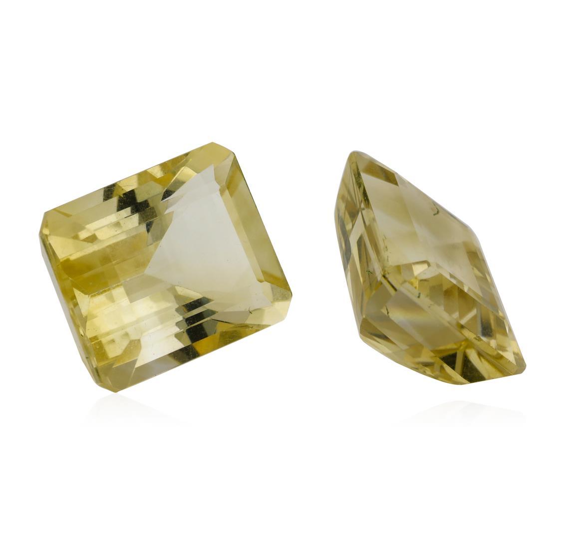 23.34 ctw.Natural Emerald Cut Citrine Quartz Parcel of Two