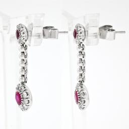 Fancy 18K White Gold 1.38 ctw Round Ruby w/ Diamond Halo Post Drop Dangle Earrin