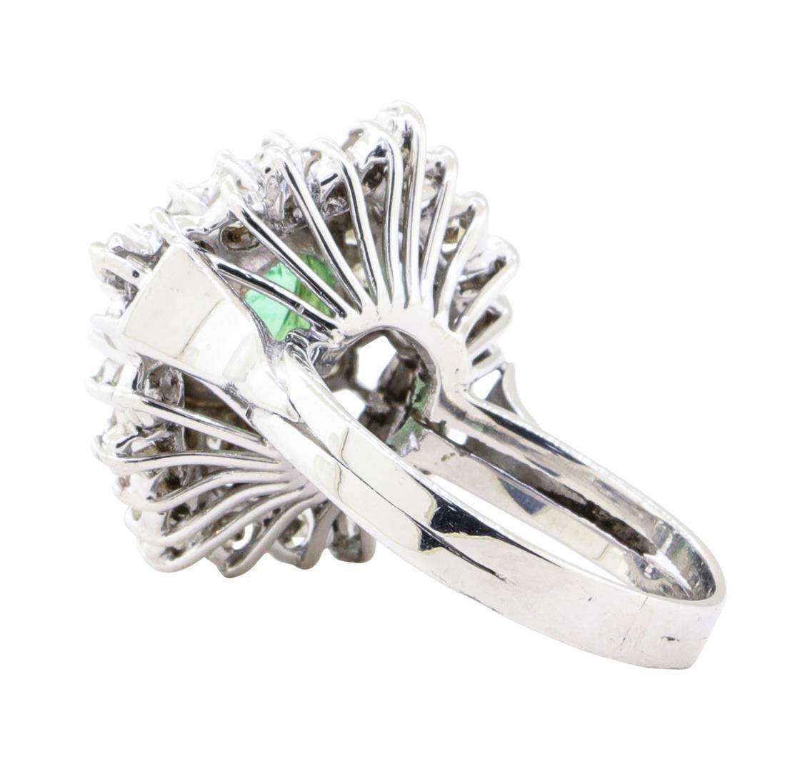 2.84 ctw Emerald And Diamond Double Halo Ring - 14KT White Gold