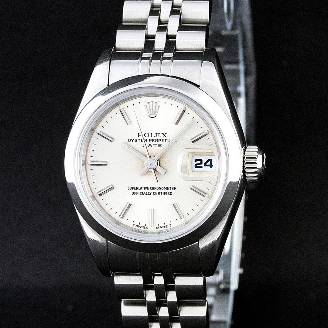 Rolex Ladies Stainless Steel Silver Index Smooth Bezel Quickset Date Wristwatch