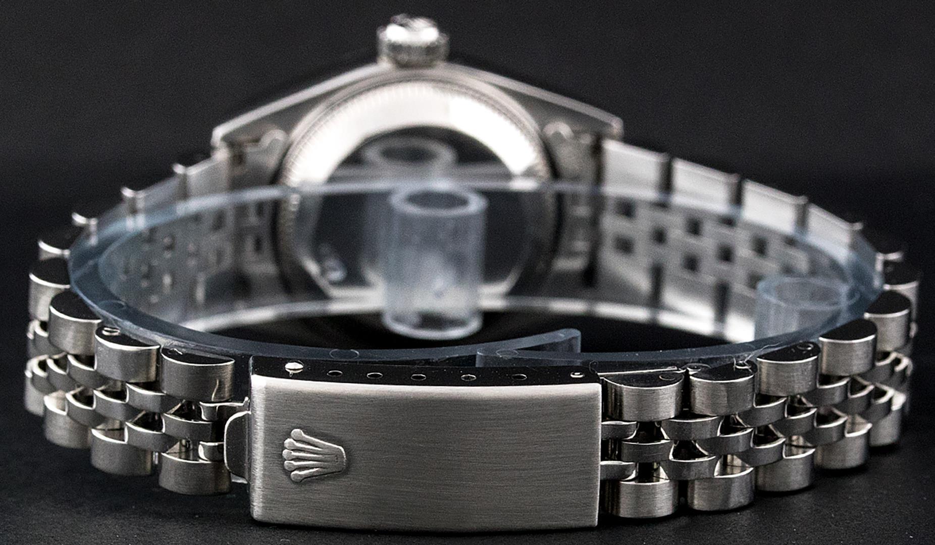 Rolex Ladies Stainless Steel Silver Index Smooth Bezel Quickset Date Wristwatch