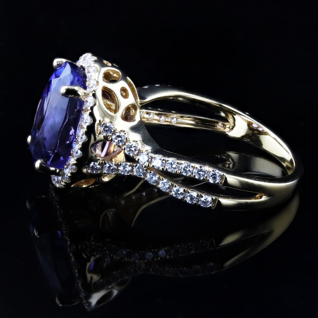 5.82 ctw Tanzanite and 0.69 ctw Diamond 18K Yellow Gold Ring