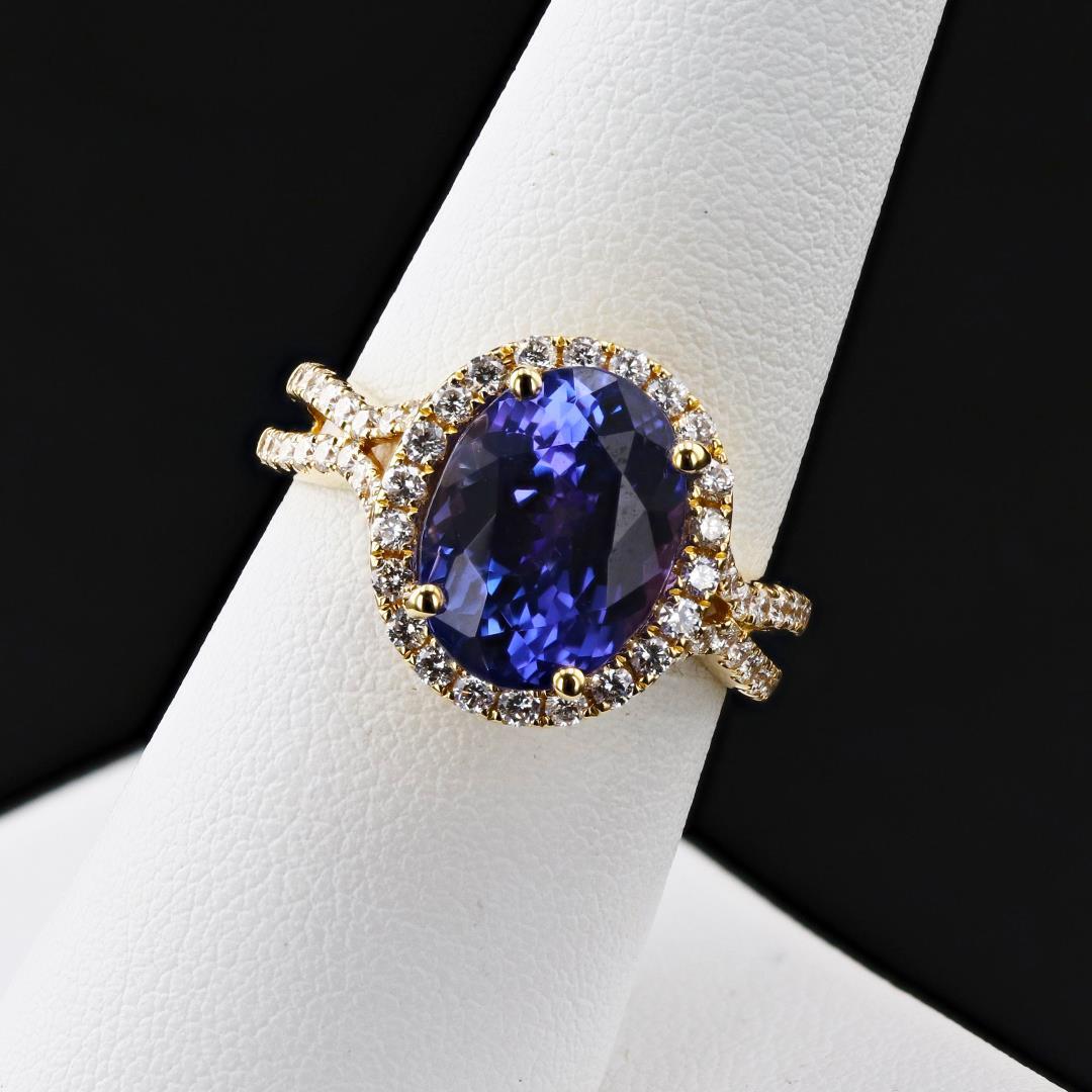 5.82 ctw Tanzanite and 0.69 ctw Diamond 18K Yellow Gold Ring