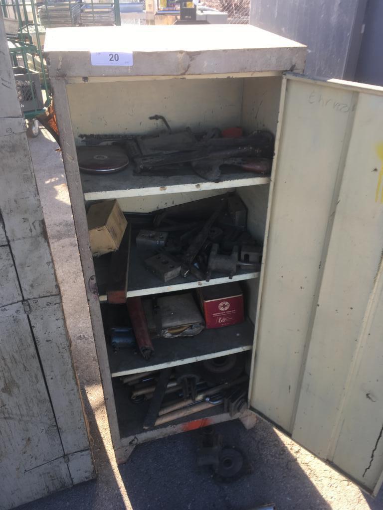 Small one door metal cabinet with contents