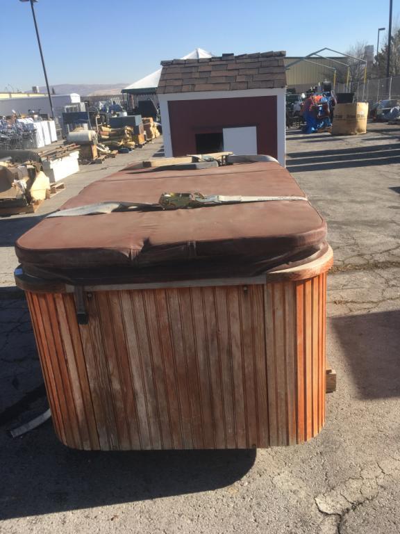 Small two-man hot tub with cover would surround