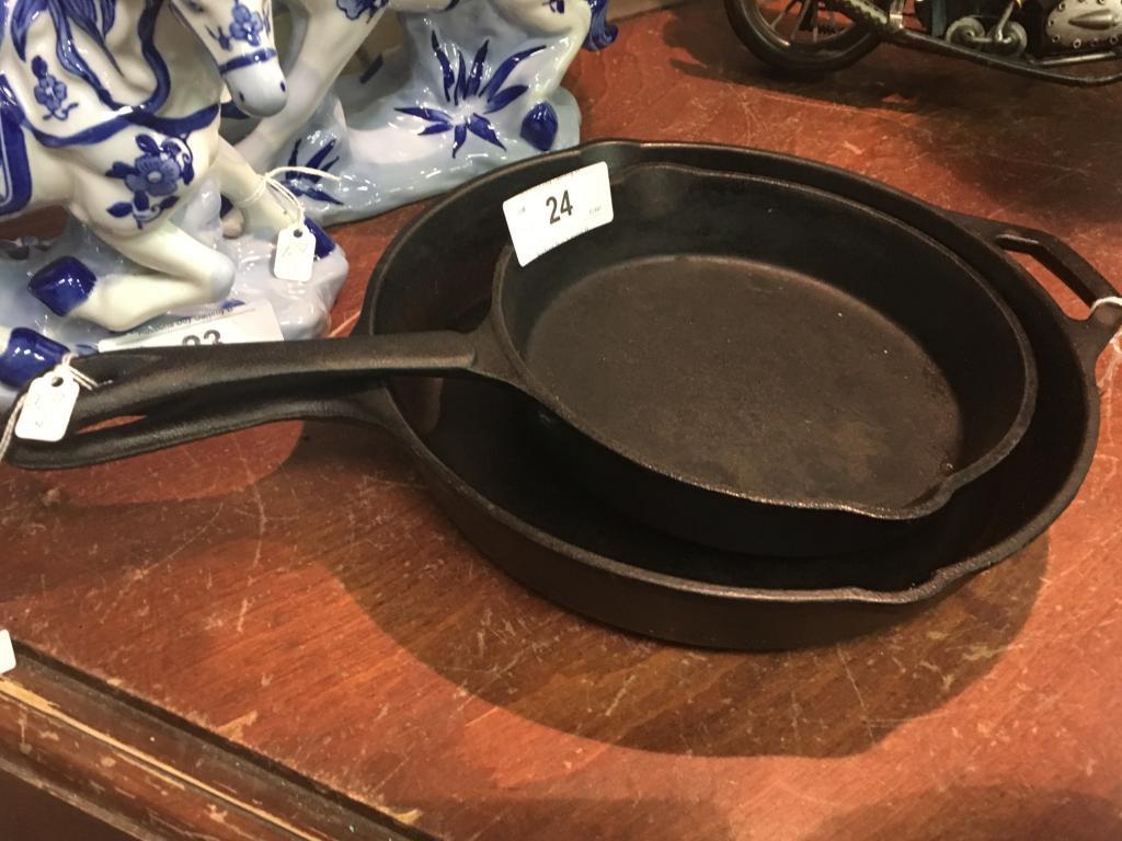 2 cast iron pans, large pan is lodge
