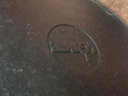 2 cast iron pans, large pan is lodge