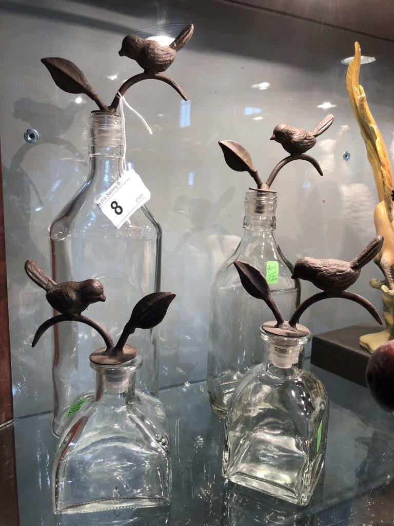 4 Decorative Bottles w/ Cast Iron Bird Stoppers