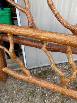 Log headboard and footboard for a bed