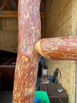 Log headboard and footboard for a bed