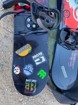 Two snowboards and travel bag