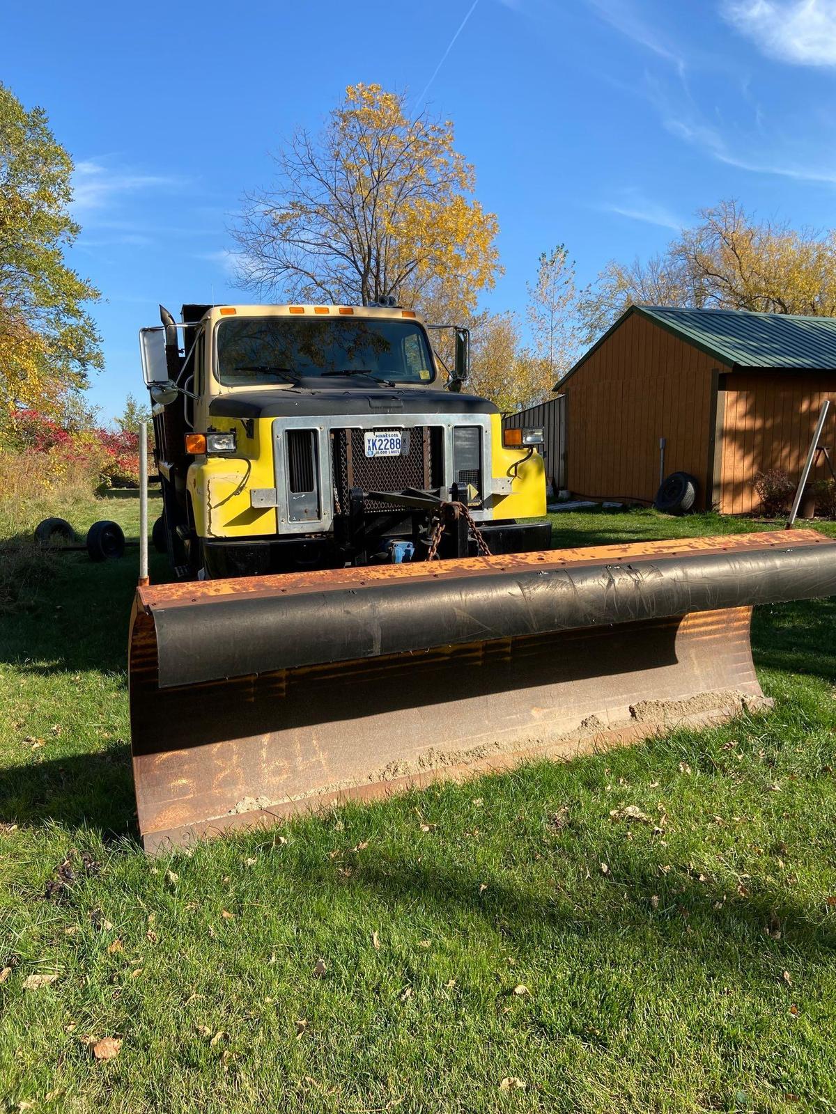 International Dump truck with snowplow and salt sander