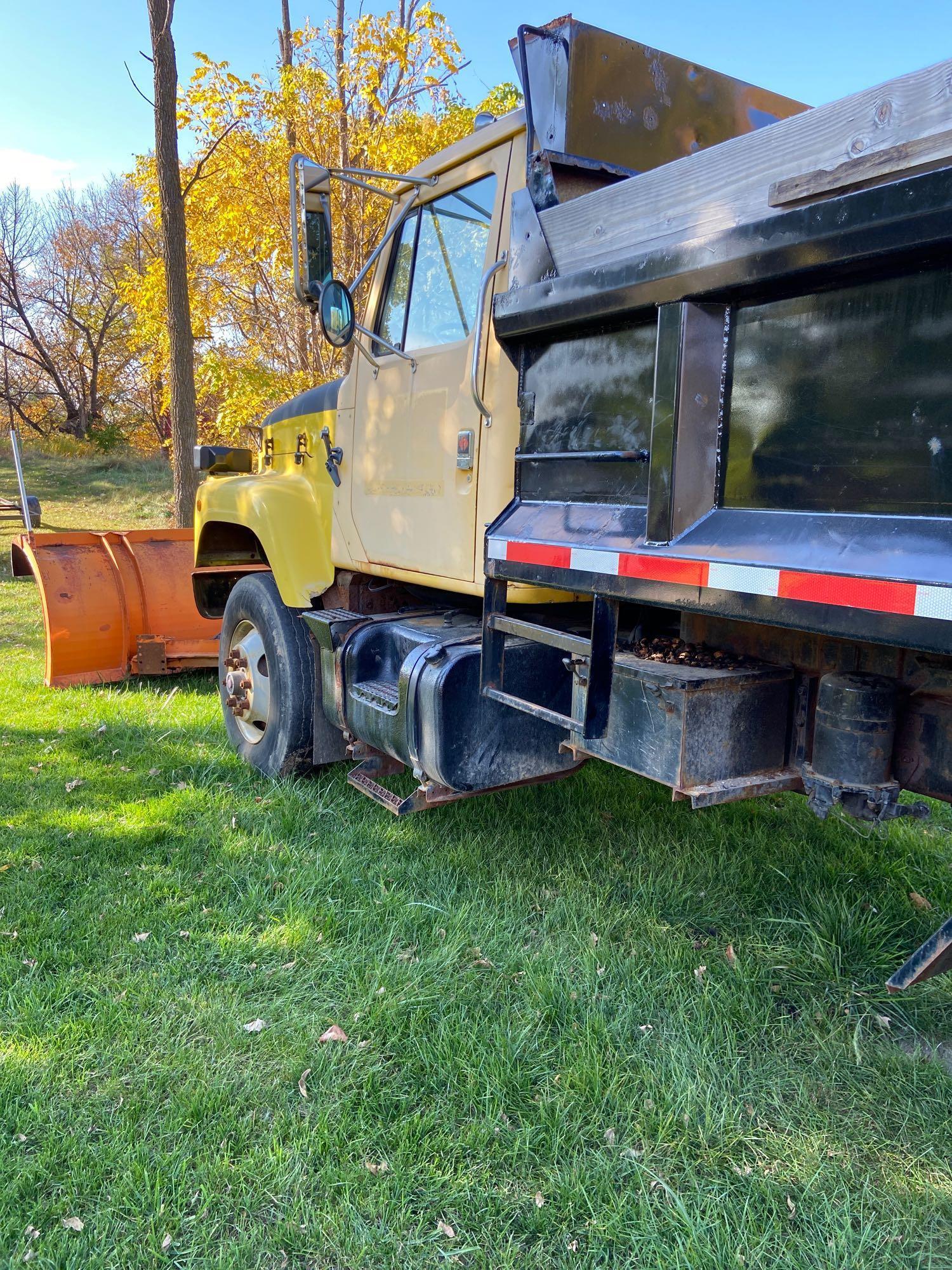 International Dump truck with snowplow and salt sander