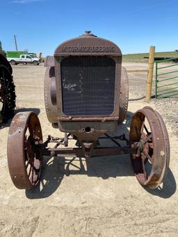 McCormick Deering steel wheel tractor