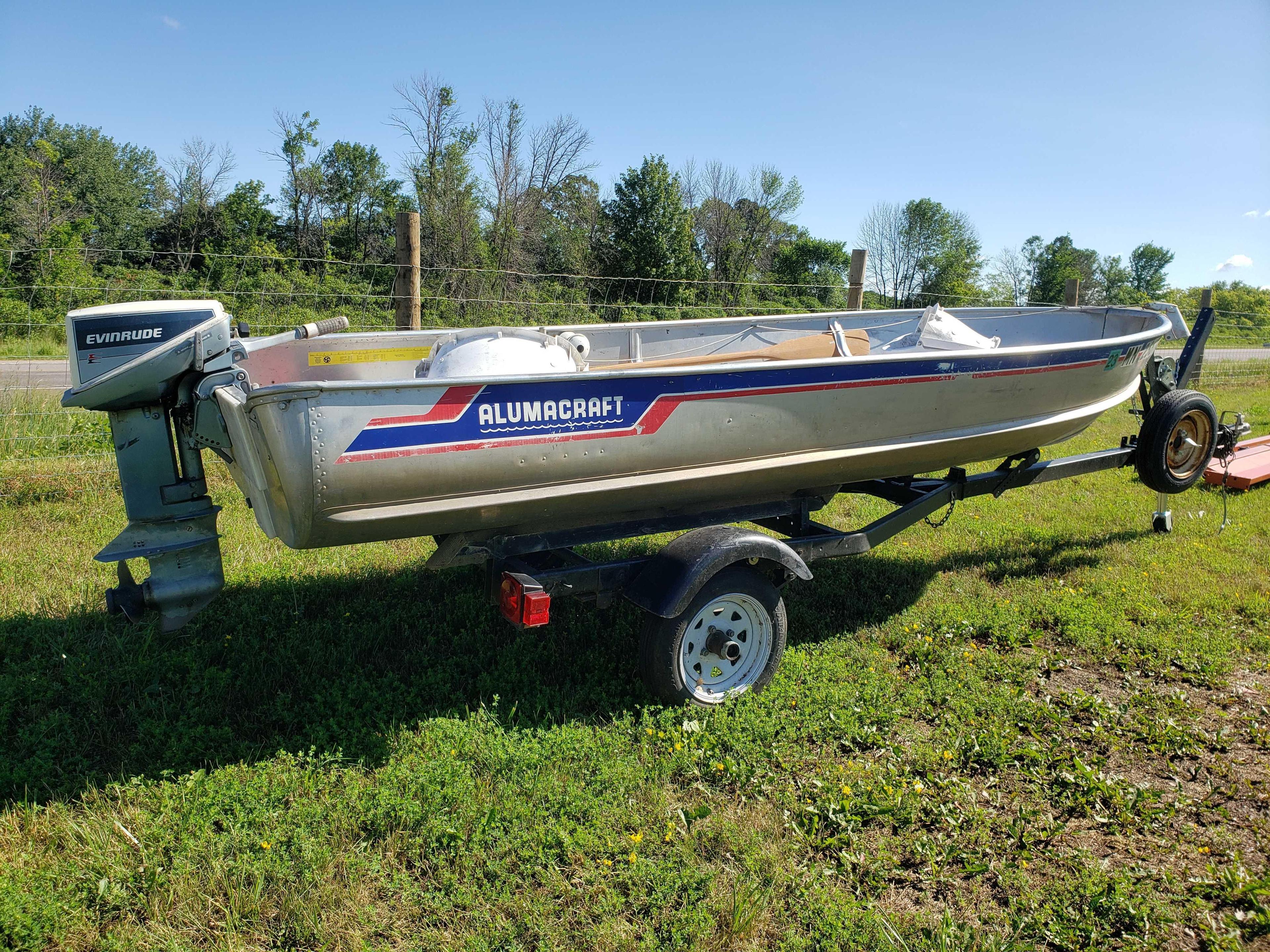 1975 Alumacraft 14 ft. Boat with Evinrude 9.9 Motor and Trailer