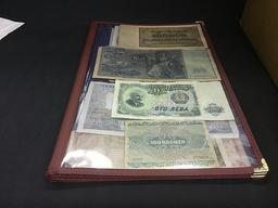 Foreign paper money in booklet