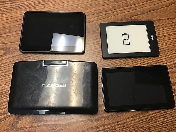 Crystalview mini laptop, three kindles