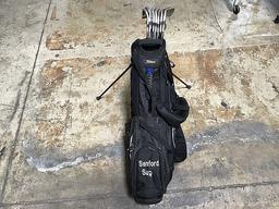 Legacy titleist golf bag with misc golf clubs
