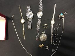 Four watches with misc costume jewelry