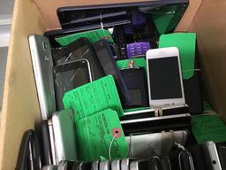 Box of cellphones Possibly locked, no chargers, some damage