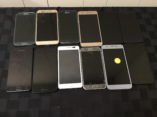 12 Samsung cell phones, possibly locked, some damage