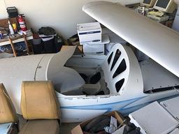AIRPLANE, SHELL OF ANOTHER PLANE, BOXES OF FILES, GARAGE OVERFLOW, BOOKSHELVES, REFRIGERATOR, DESK,