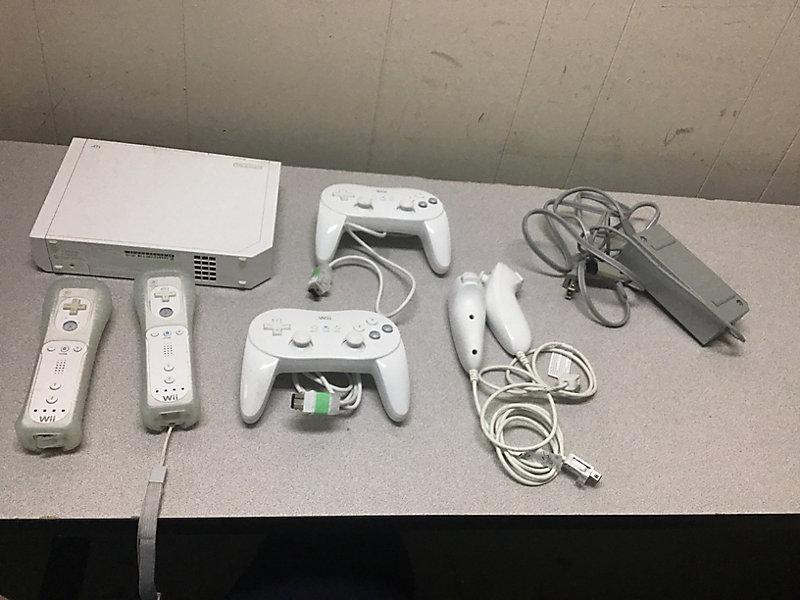 Nintendo Wii with controllers NOTE: This unit is being sold AS IS/WHERE IS via Timed Auction and is