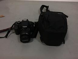 Canon EOS rebel T4i camera with bag (Used ) NOTE: This unit is being sold AS IS/WHERE IS via Timed A