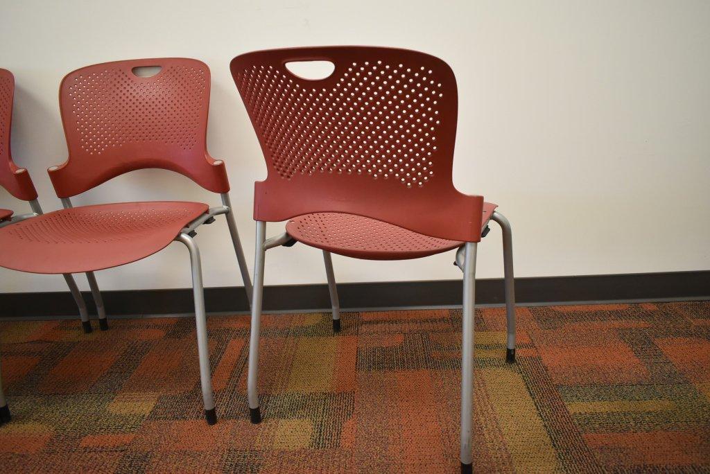 4 Red Herman Miller Caper Stack Chair's