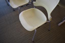 2 Yellow Herman Miller Caper Stack Chair's