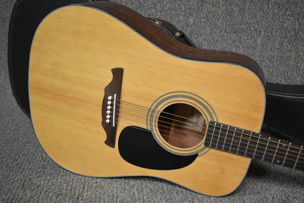 Acoustic Guitar With Case